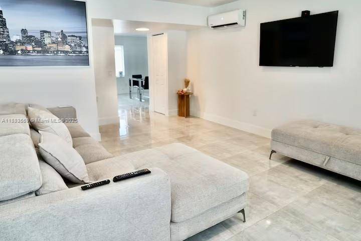 This unique multifamily property offers two separate residences on a spacious corner lot, blending style, comfort, and investment potential.