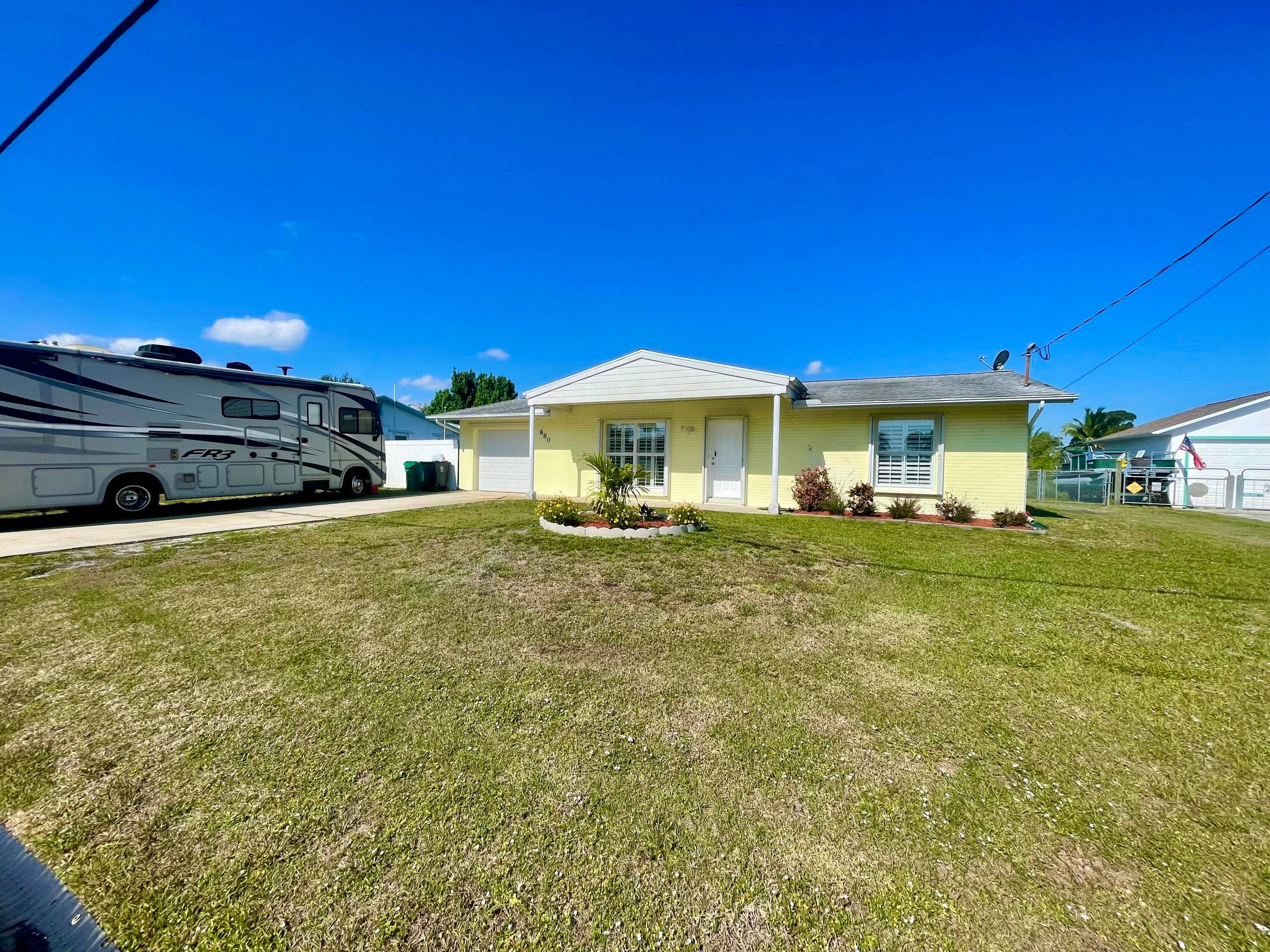 Experience Florida living at its finest with this ocean access extra large almost 1700 SF 2 bedroom 2 bath CBS home updated to include a huge primary bath and bedroom, ...