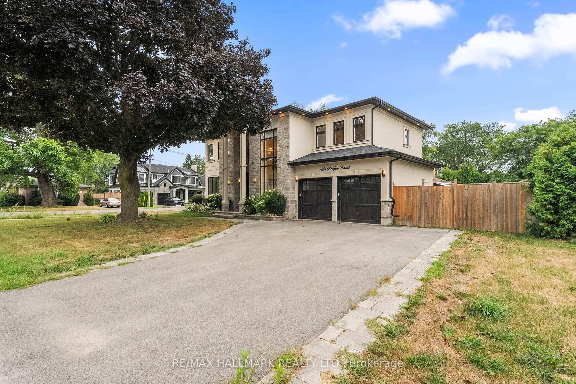 Custom built home on a premium corner lot in one of Oakville's most sought after neighbourhoods.