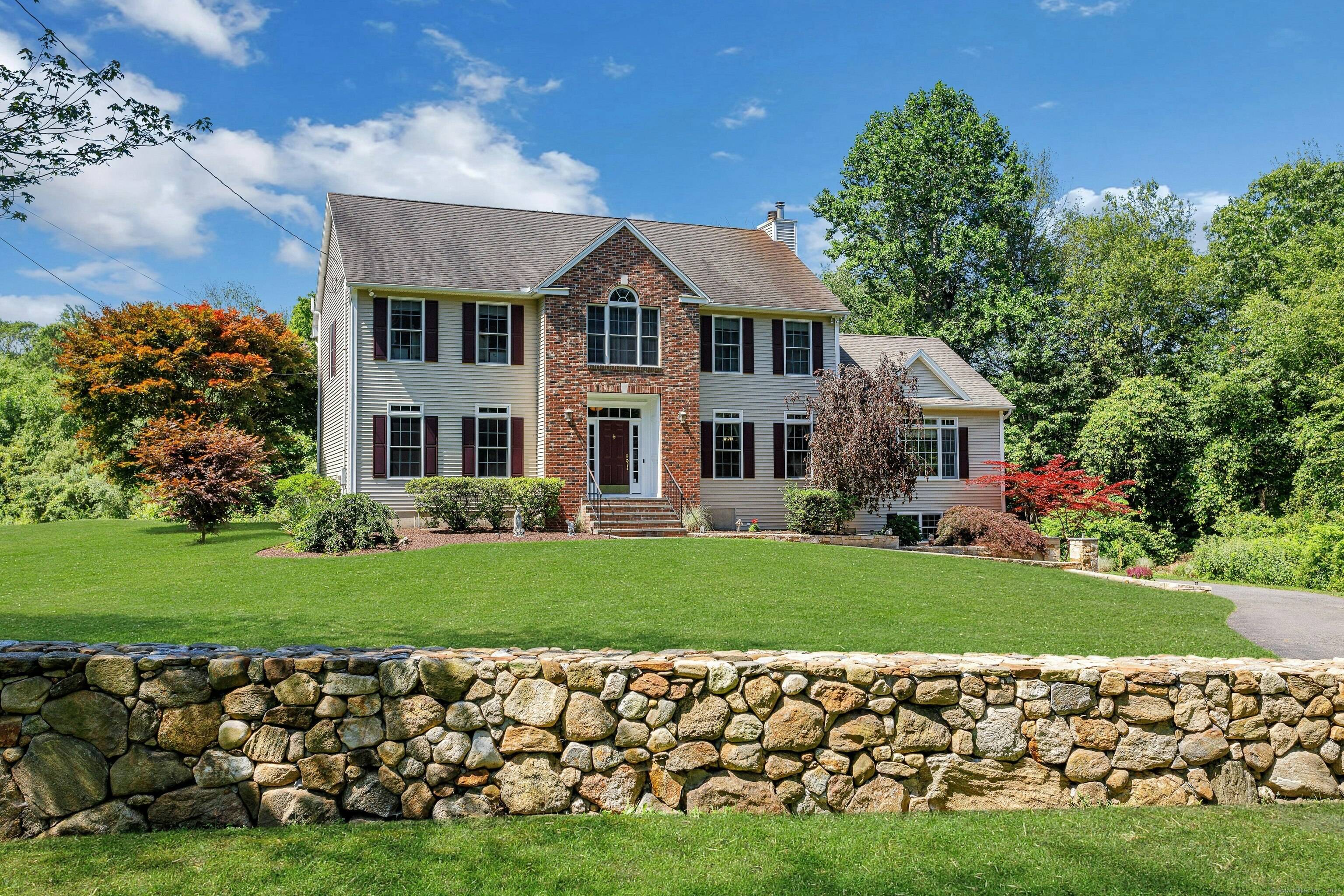Stunning Colonial in Sought After Huntington Welcome to this exquisite, quality crafted 10 room Colonial offering over 3, 500 square feet of exceptional living space, nestled on 2.