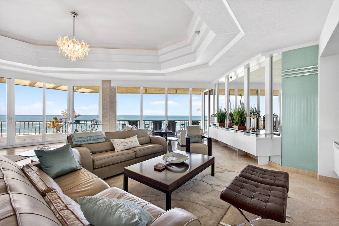 Experience elevated coastal living in this three bedroom, three and a half bathroom Sailfish Point PENTHOUSE with unobstructed Atlantic Ocean views.