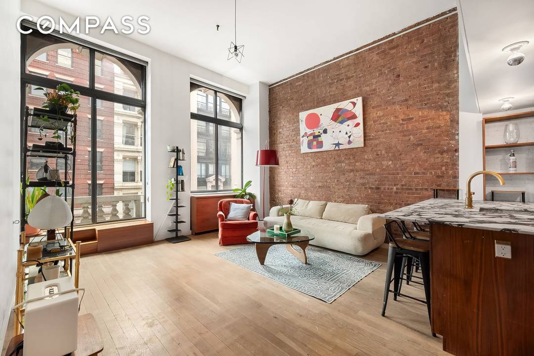 Located at 77 Bleecker Street, this spacious one bedroom duplex loft combines historic character with modern design in one of downtown Manhattan s premier full service buildings.