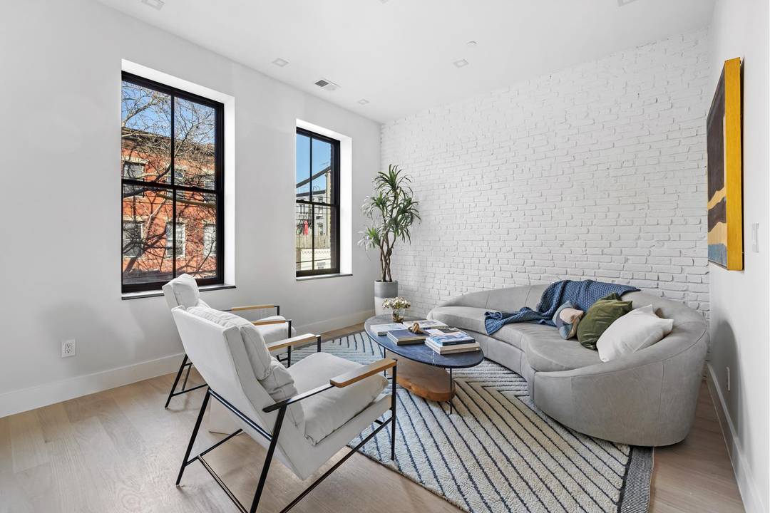 Introducing 112 Luquer Street, nestled in the vibrant heart of Carroll Gardens !