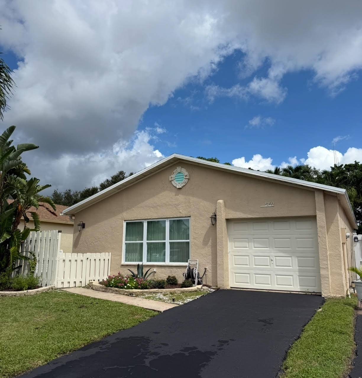 2BR 2BA charmer in popular Boynton Beach HOPA 55 community.