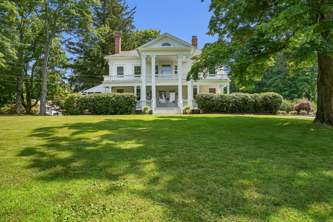 Elegant Georgian Colonial 15 room home in prime location overlooking downtown Ridgefield.