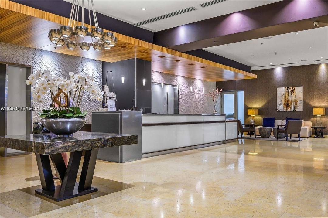 Live above it all in this rare 34th floor, two story 01 corner unit in Brickell.