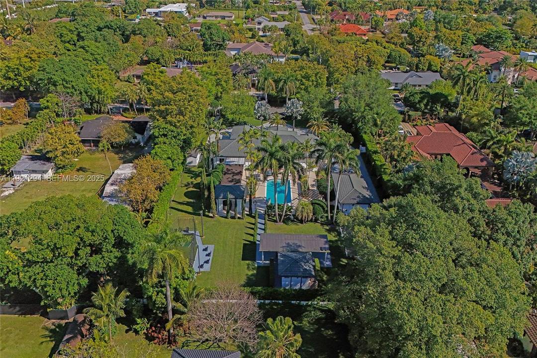 Exquisite, fully renovated home featuring a 4, 496 SF main house plus a spacious guest house.