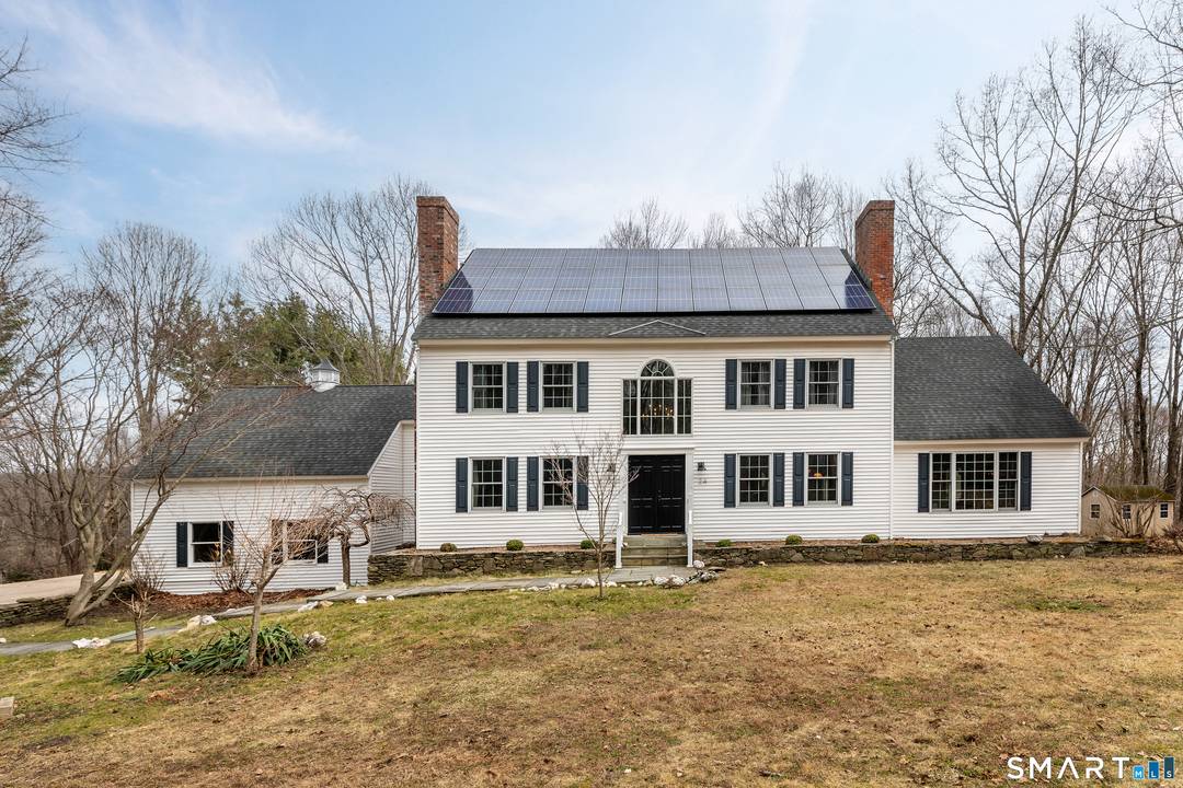 Tucked away in one of Roxbury's most desirable neighborhoods, this 4 bedroom, 2.