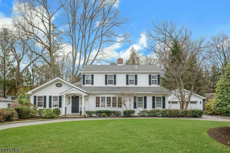 This beautifully maintained Colonial is set on a.