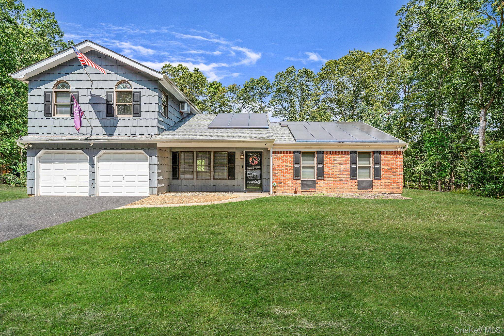 Welcome to 5 Hastings Drive in Ridge a beautifully updated expanded ranch offering 2, 000 sq.