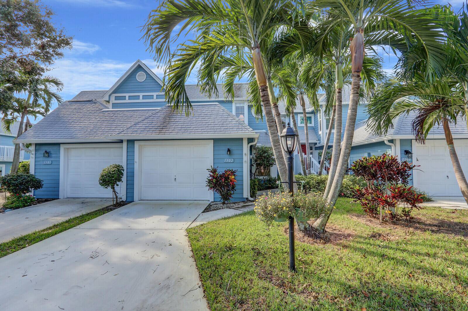 EXPERIENCE THE BEACHSIDE LIFESTYLE WITH THIS DESIRABLE FLOOR PLAN FEATURING THE PRIMARY SUITE CONVENIENTLY LOCATED ON THE FIRST FLOOR.