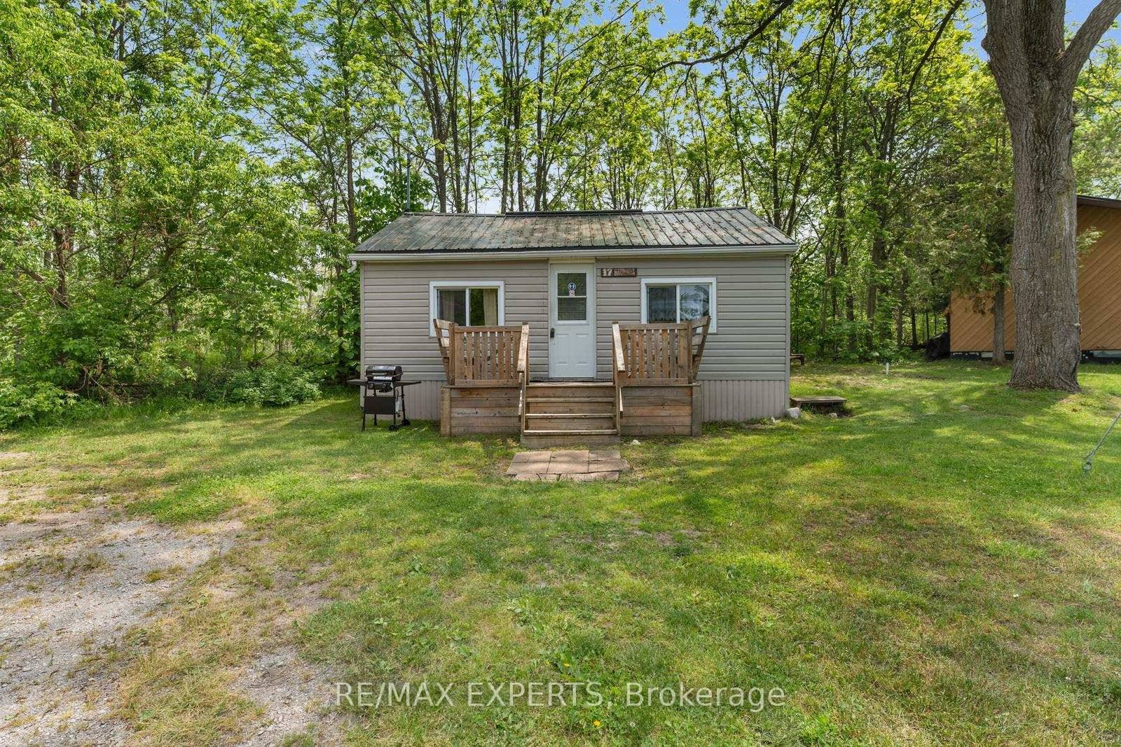 Welcome to Unit 17 at Lake Dalrymple Resort a charming three season cottage tucked into a quieter, more private pocket of the resort.