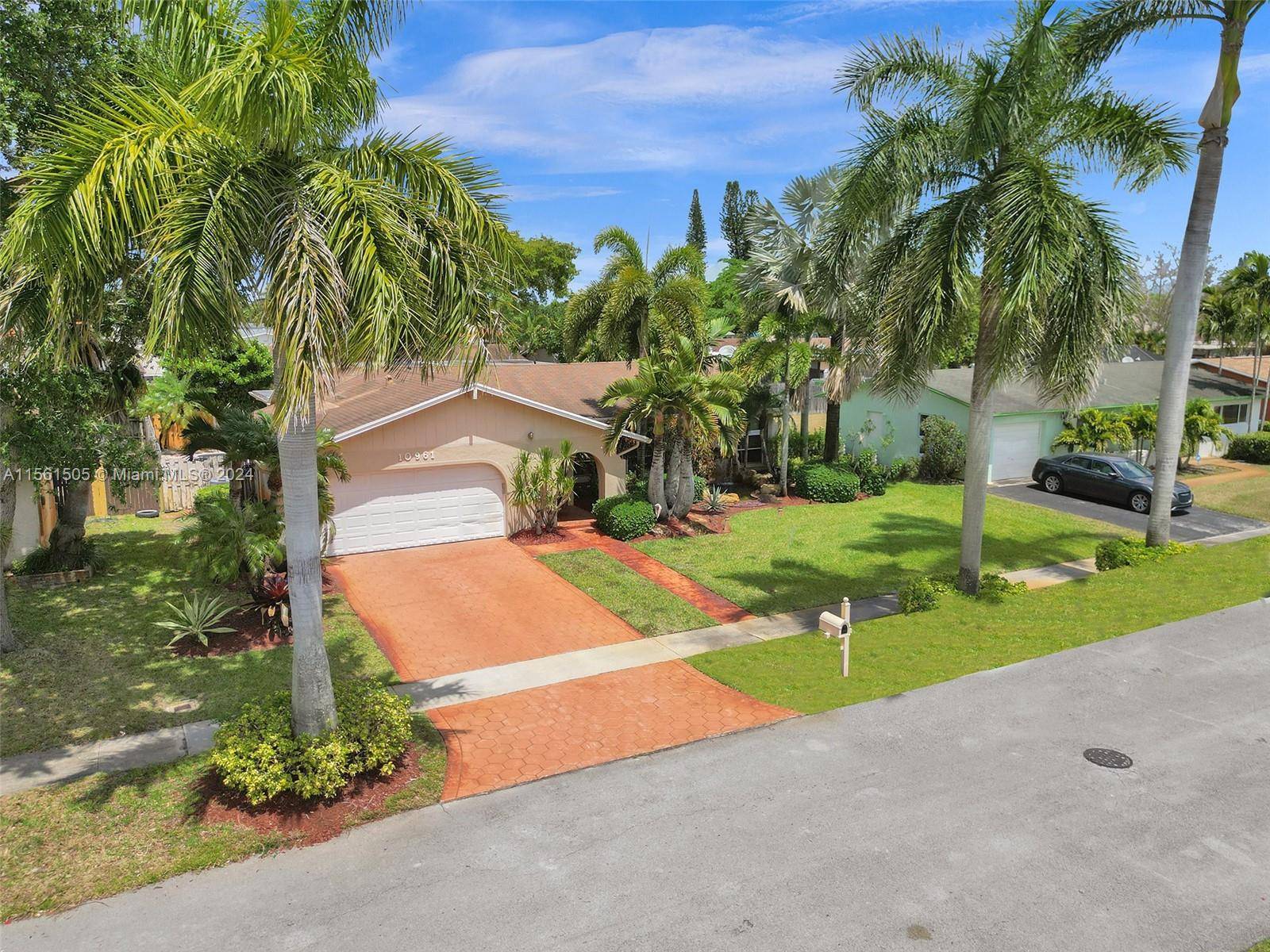 Gorgeous updated 3 bedroom with 2 bathrooms, pool and 2 car garage.