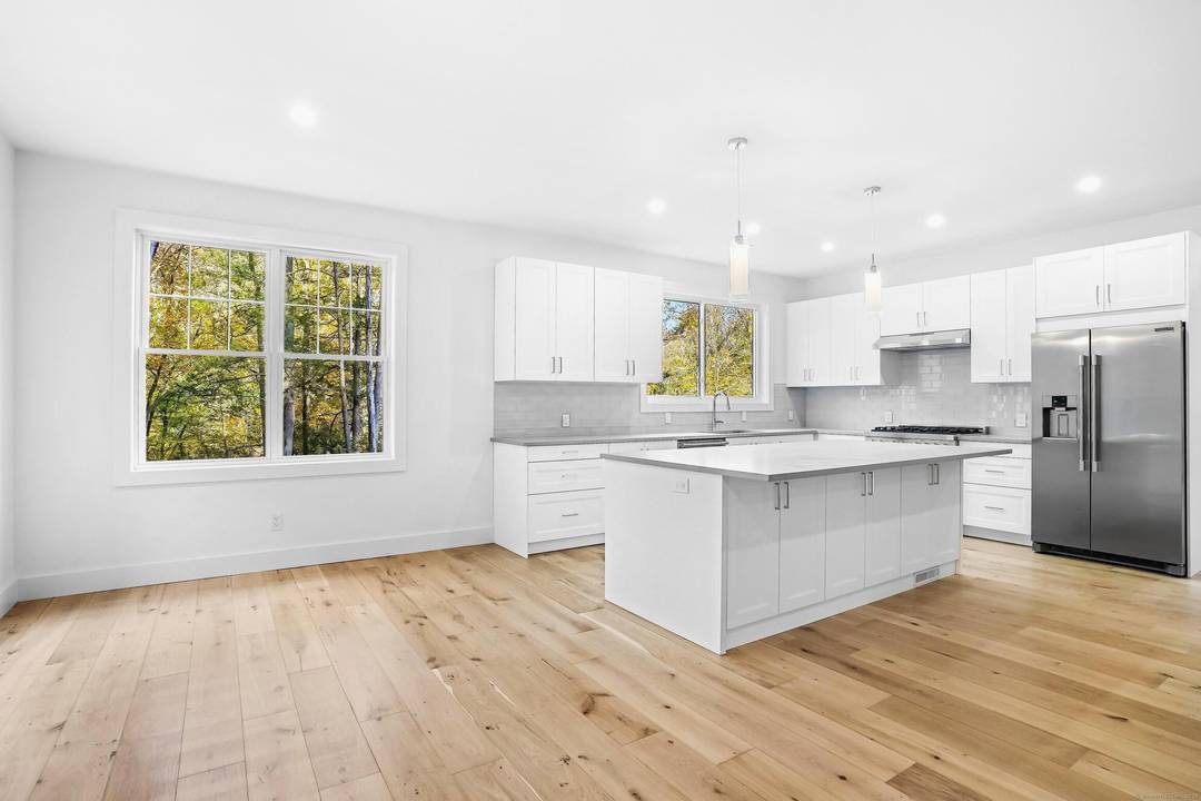 Quality New Construction Colonial Elegance Meets Modern Comfort.