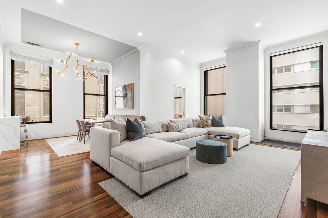 No detail was overlooked in this renovated 3 bedroom, 2 bathroom corner prewar loft in this boutique TriBeCa condominium.