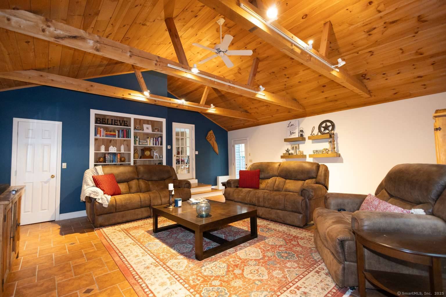 Nestled in a peaceful wooded setting, this beautifully maintained 4 bedroom, 2.