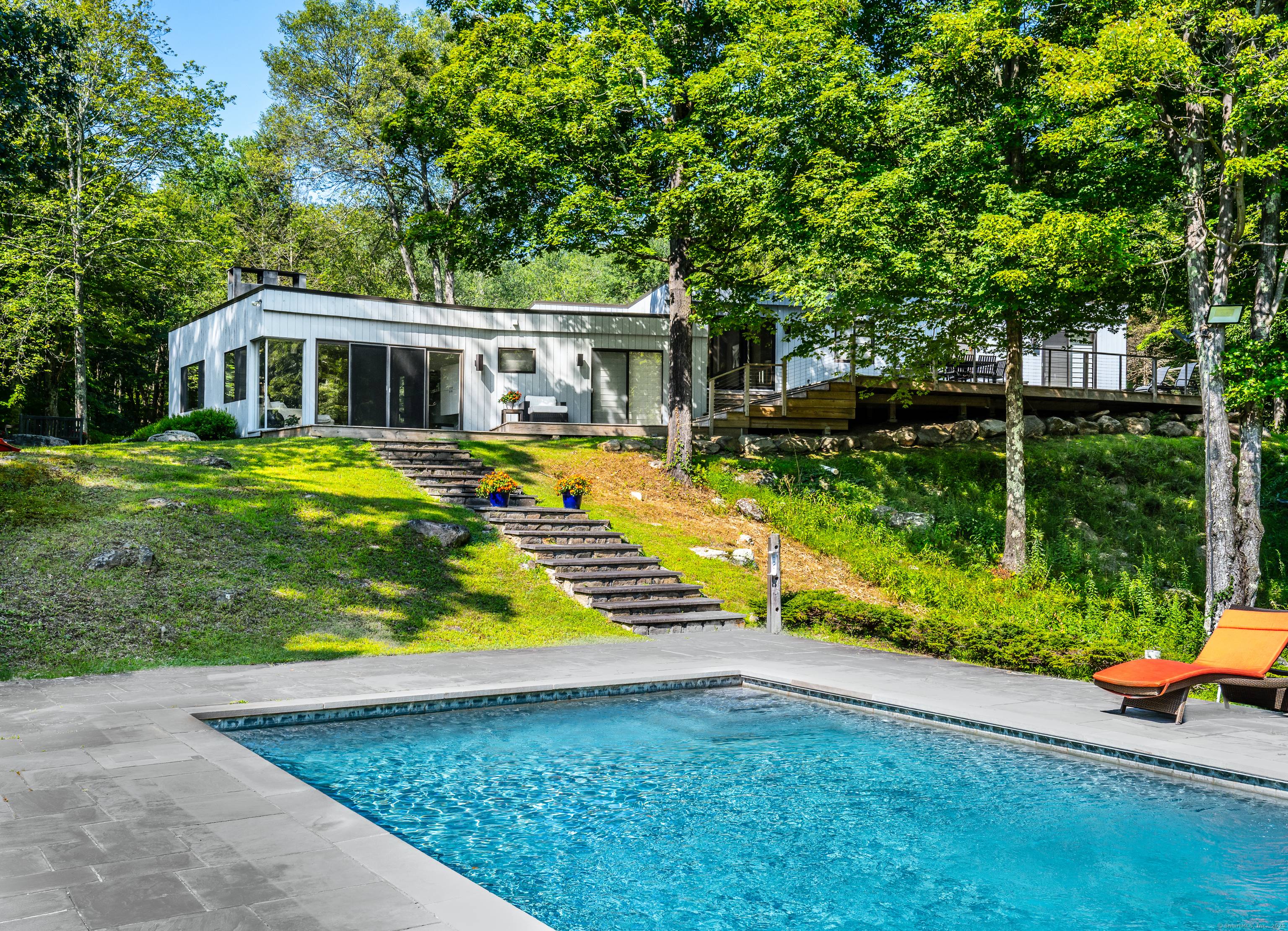 Modern country elegance is displayed at this residential retreat in Sherman CT.