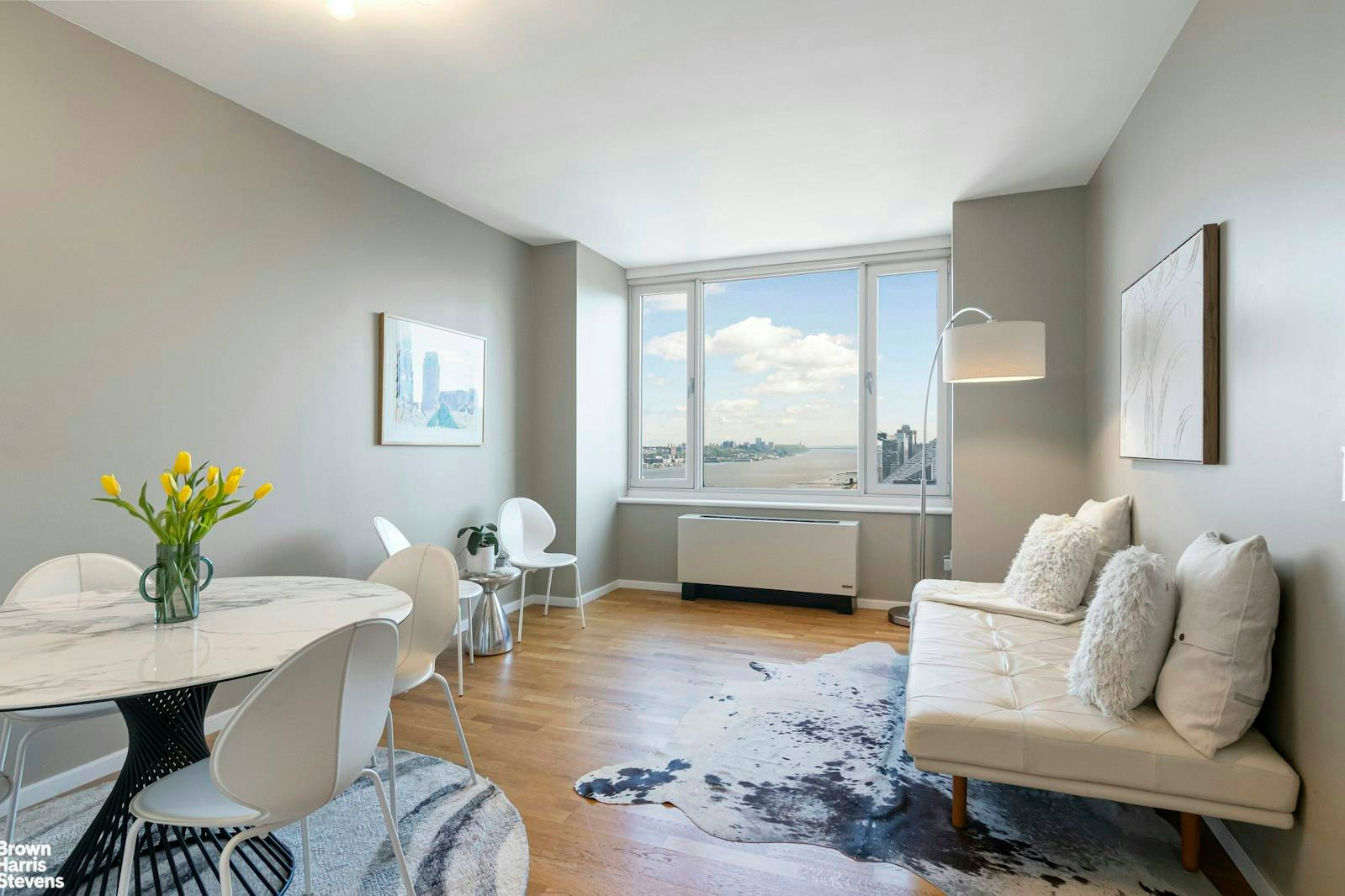 Modern Apartment with Breathtaking Views Experience sweeping views of the Hudson River and Midtown Manhattan skyline from every window of this stunning 2 bedroom, 2 bathroom condominium perched on the ...