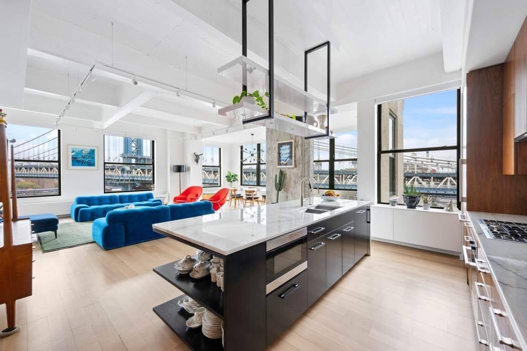 This breathtaking northeastern corner loft just recently underwent a meticulous full gut renovation, completely reconfigured and transformed into the true essence of DUMBO loft living.