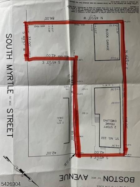 Updated two family property located on a quiet street yet close to stores, schools, public transportation highways THREE car garage with parking for approx.