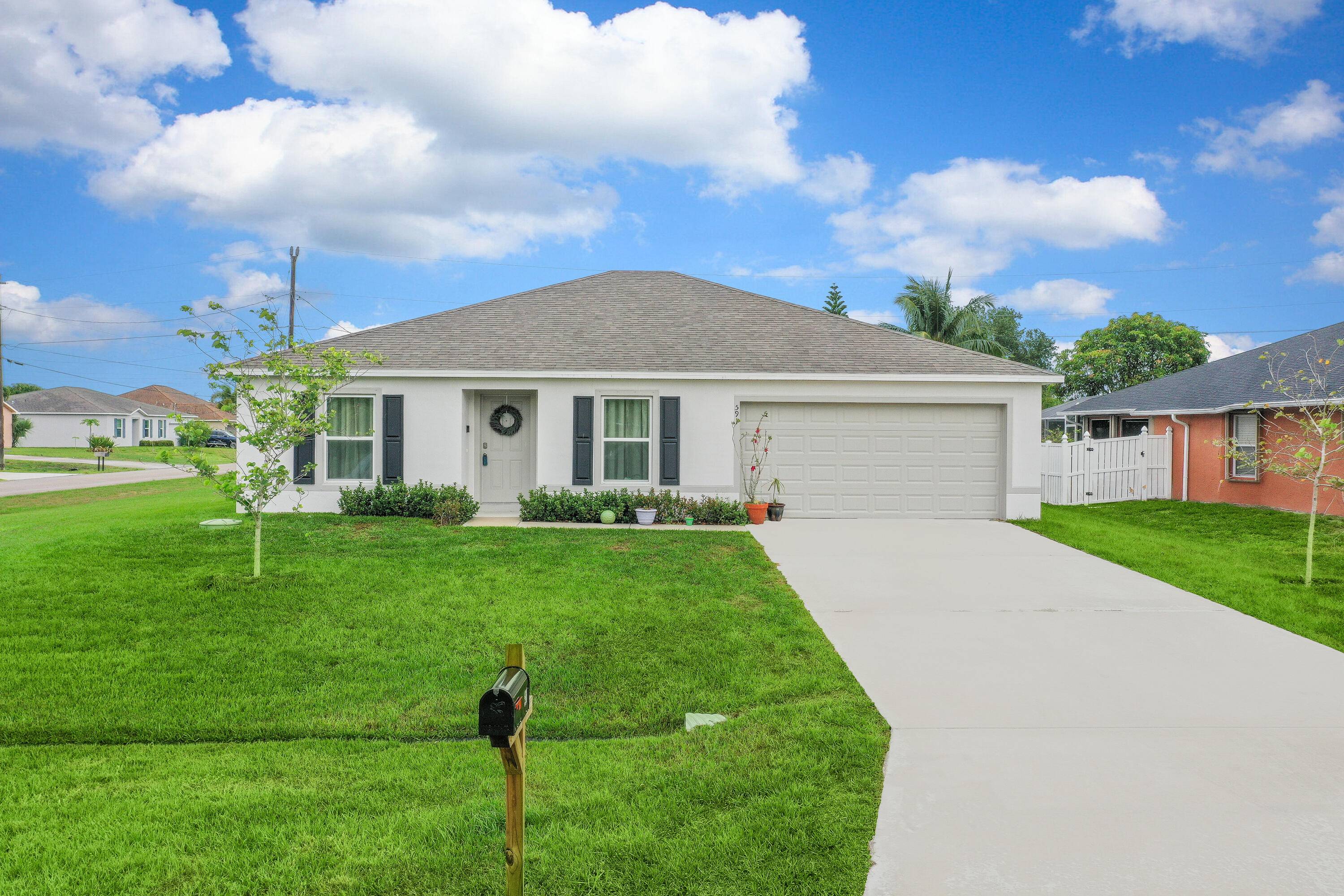 Step into this beautifully designed 2024 new construction home located on a spacious corner lot in the heart of Port St Lucie.