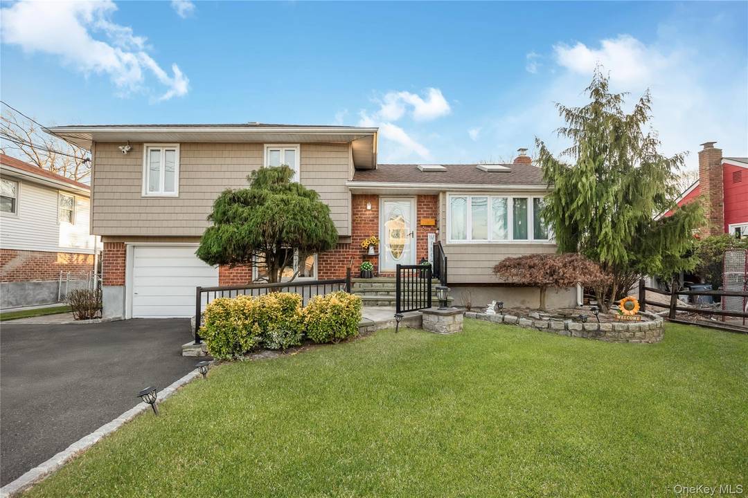 Welcome to this beautifully maintained 4 level home featuring 4 bedrooms plus an additional finished lower level room, 2.