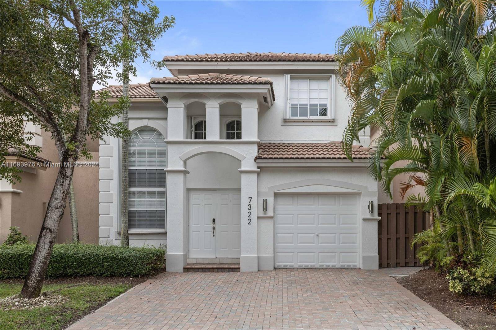 Experience Luxury Living in Doral Isles Resort This stunning two story Martinique model offers 3 bedrooms, a convertible den, and 2.