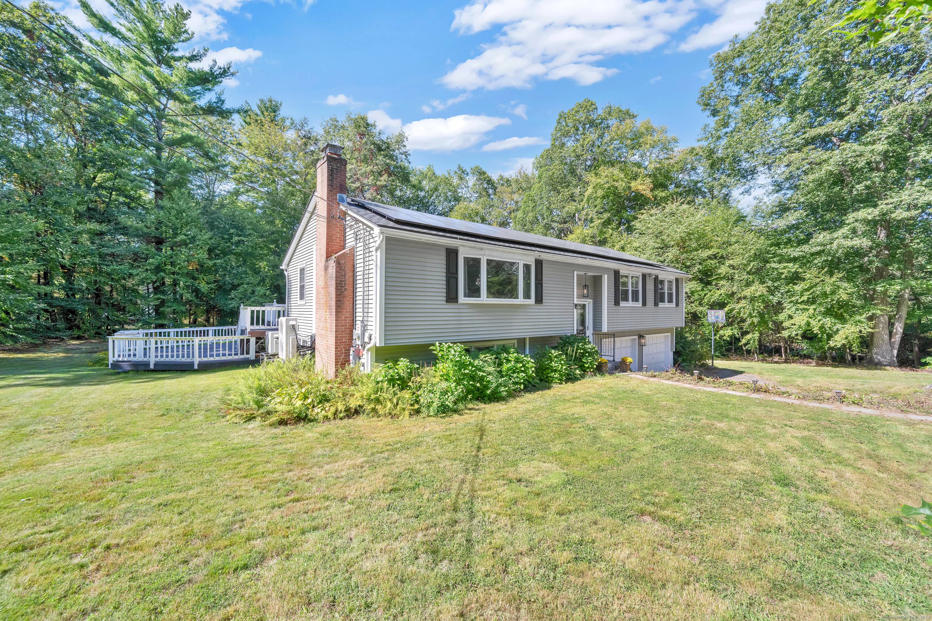 Welcome to 12 Gretel Lane a beautifully maintained Raised Ranch in one of Simsbury's most desirable neighborhoods.