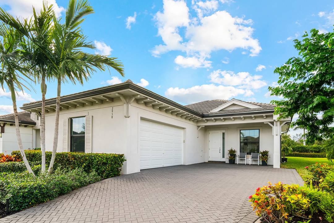 Come home to this newly built, stunning, pristine, chic three bedroom three bath home in exclusive Banyan Cay, a gated community East of I 95, perfect and ready for seasonal ...