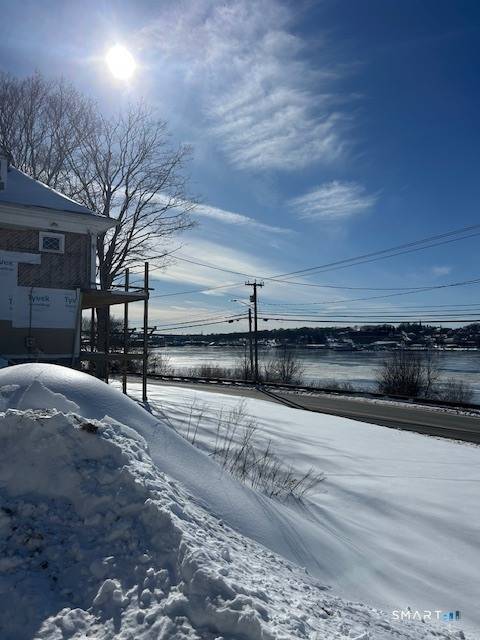 Rare 6. 31 Acre Water View Opportunity Ready for the final touches Subdivision Potential Discover an extraordinary waterfront estate offering breathtaking water views and exceptional potential.