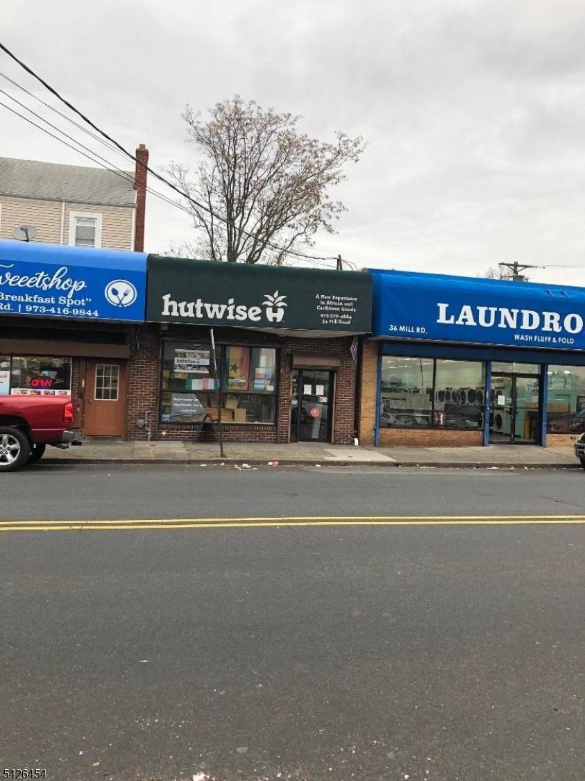 Rare mixed use offers two retail store, one two story 3 BR apartment with drive way, BackyardExcellent rental history