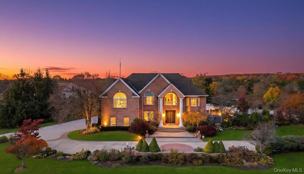 Exquisitely updated, Palatial 5600 square foot 6 bedroom, 5 1 2 bath Post Modern brick faced Colonial built in 2001 is located in the exclusive Sweet Hollow Farms gated community ...