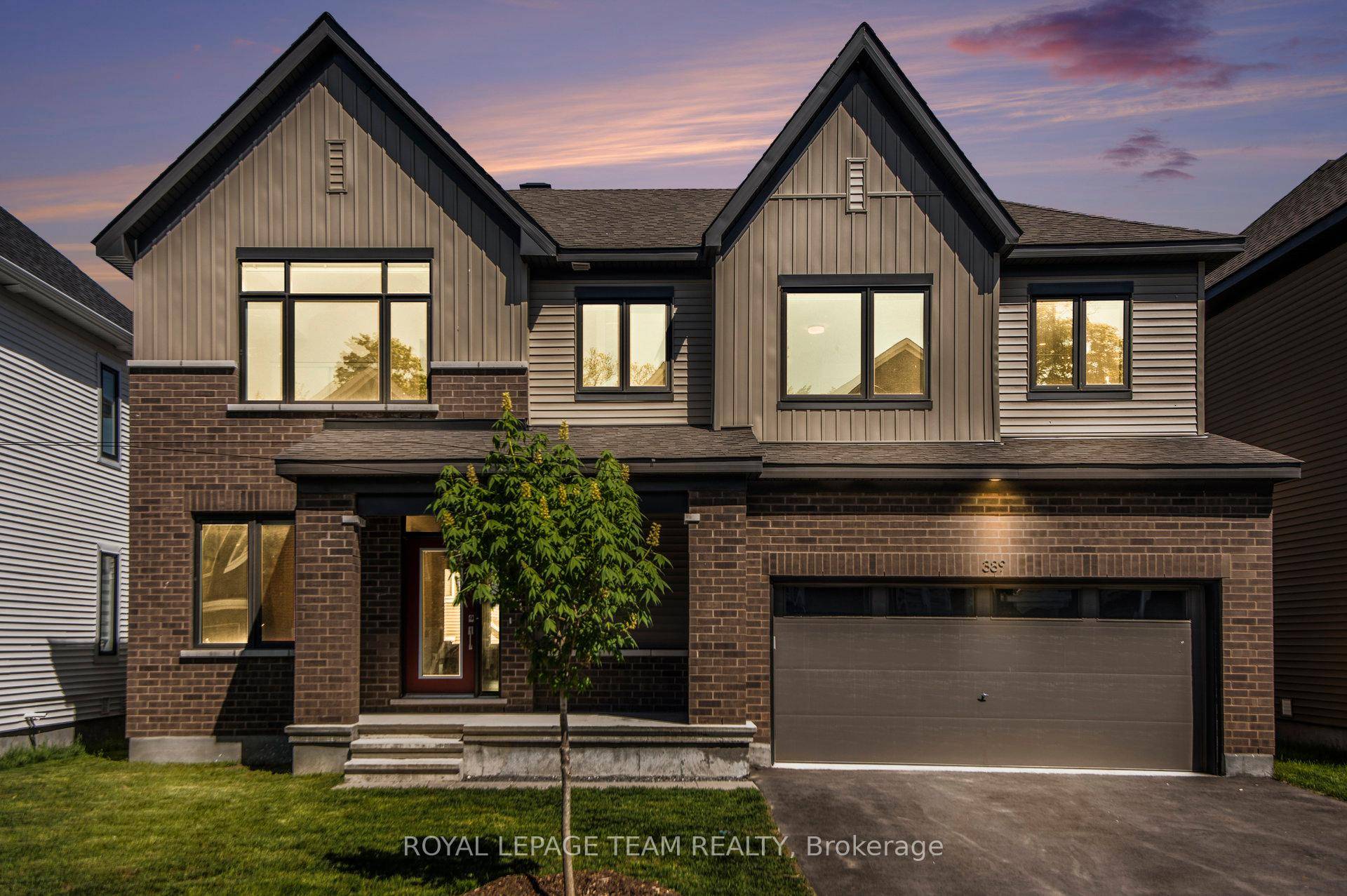 Stunning 4 Bedroom Home with Loft, Den amp ; Finished Basement on a Premium 50 Foot Lot !
