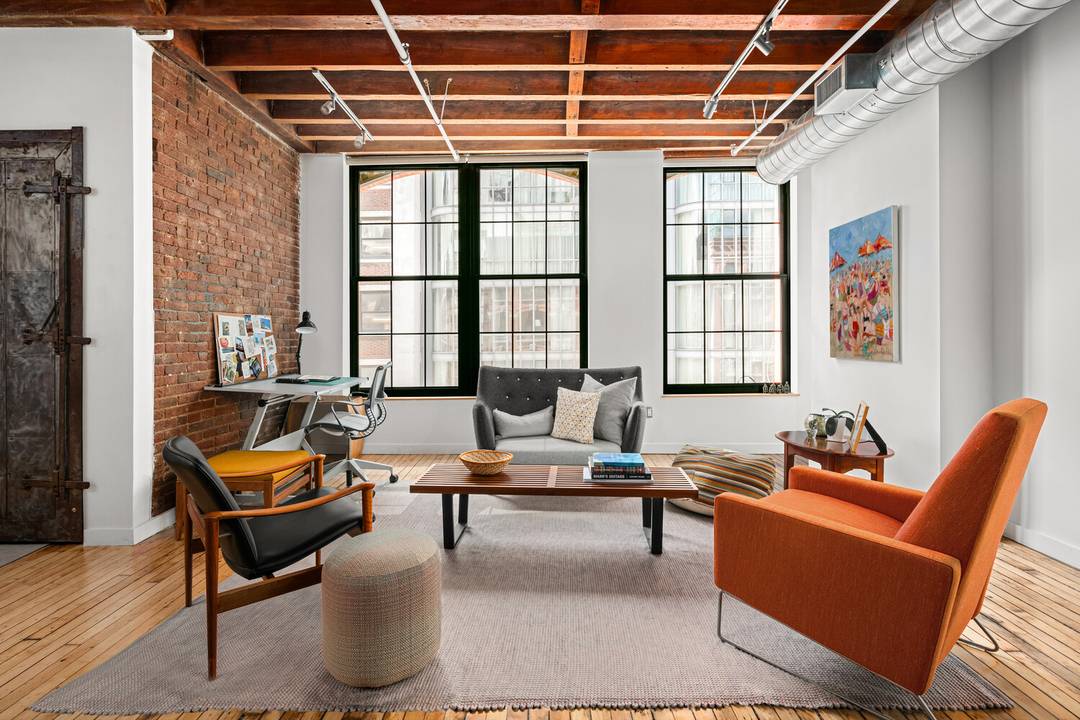 Newly renovated full floor condominium loft with modern finishes and original pre war detail.