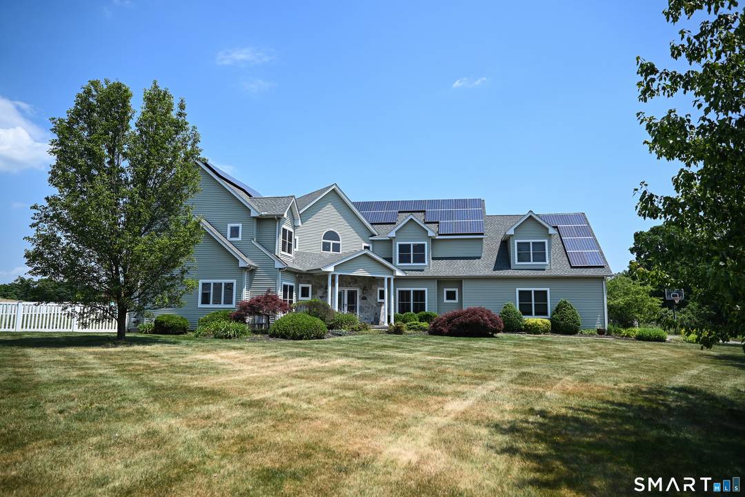 Discover a spacious and serene retreat in desirable North Haven, Connecticut perfect for families, friends, or if you are working in the area.