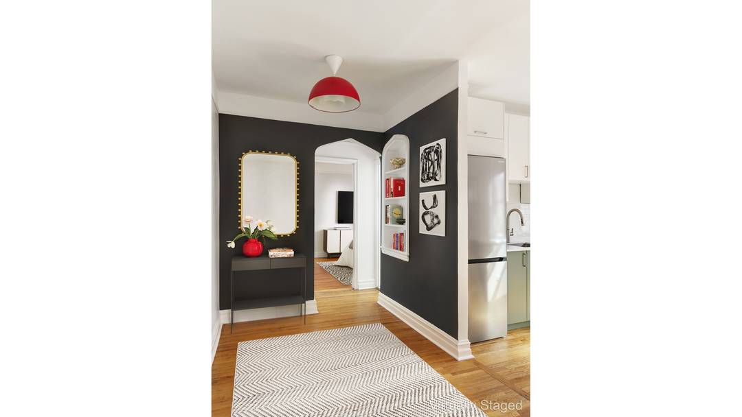 Charming, renovated one bedroom with loads of sunshine.