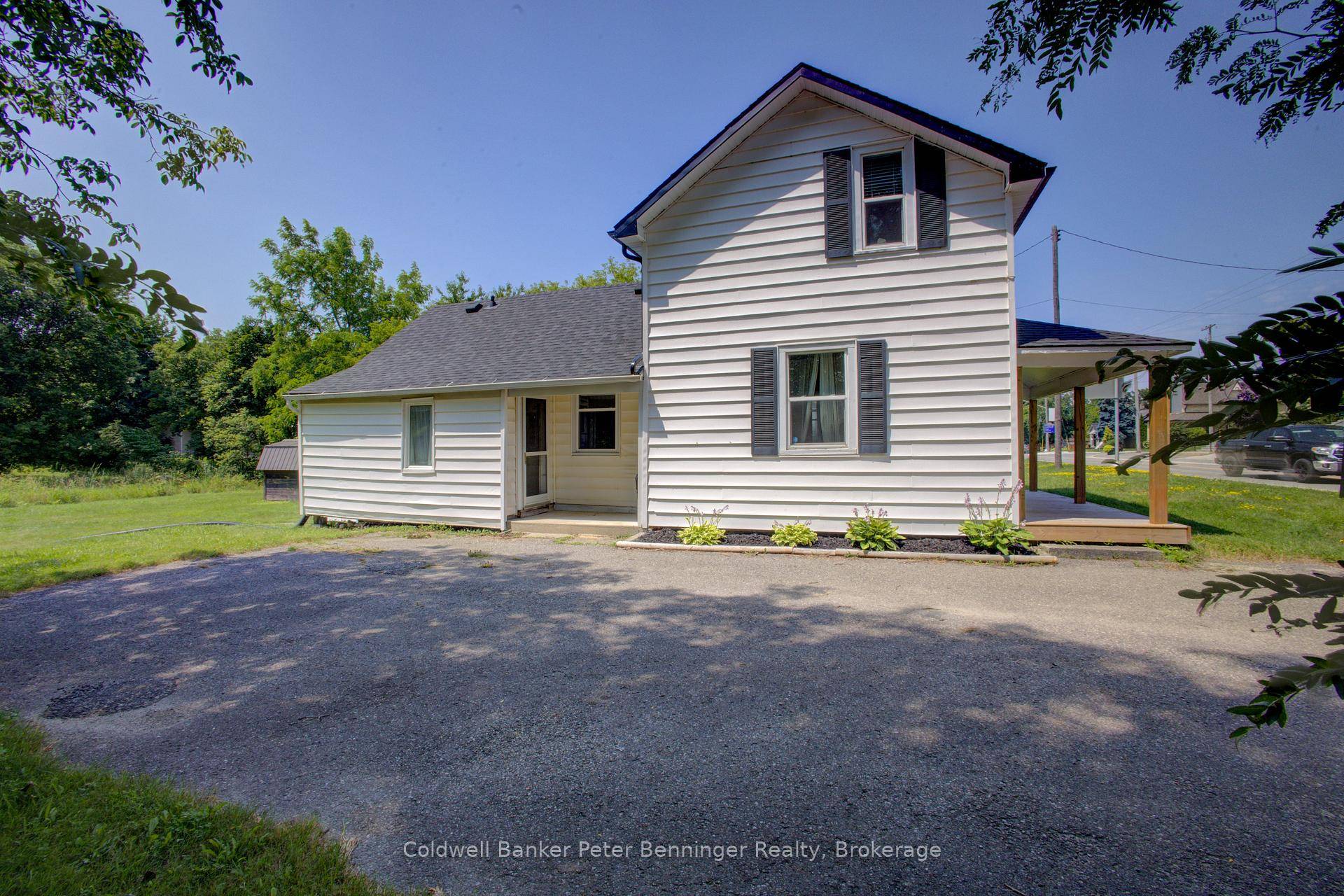 In Tiverton a four bedroom, two bath, 1 1 2 storey home plus one storey addition, enhanced with renovations in recent years.