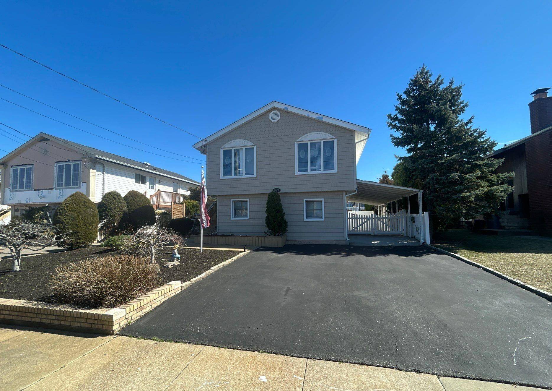 Outstanding and spacious waterfront raised ranch style home with 50 of frontage on a beautiful canal, 2 full bathrooms, fireplace, very large den area, and outstanding potential.