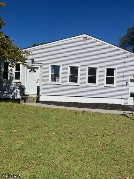 Lovely 3 bedroom 1. 5 baths with wood burning fireplace ranch home, newer windows, patio, driveway, walkway and steps.