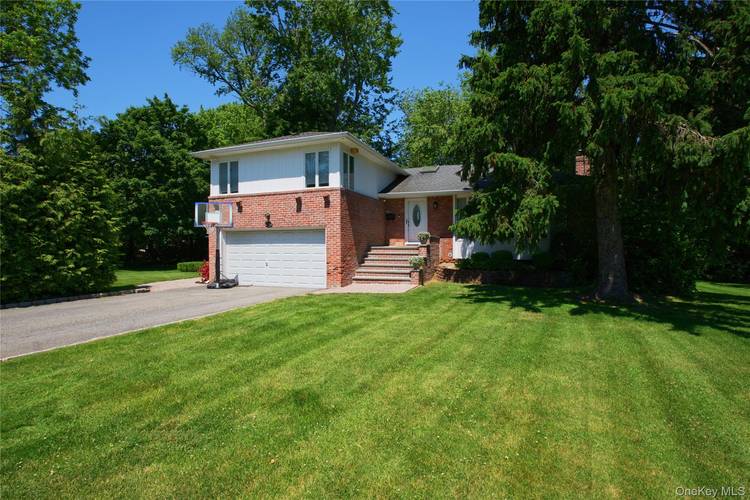 Welcome to 16 Cherrywood Lane, a beautifully updated 3 bedroom, 3.