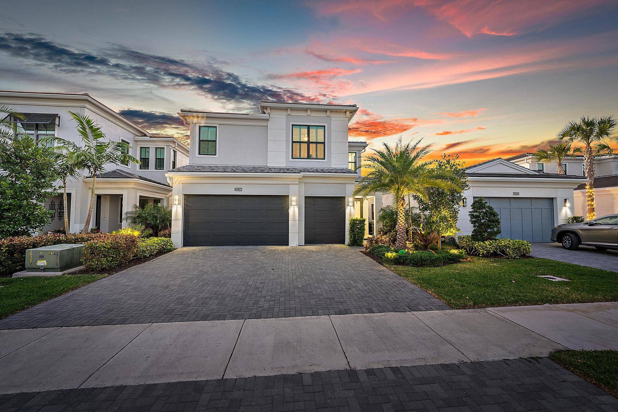 Discover this exquisite ''Hudson'' model home, thoughtfully designed to blend modern luxury with practical living in the new prestigious Palm Beach Gardens guard gated community Artistry.