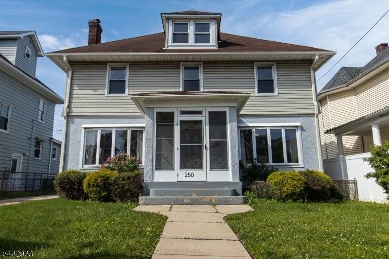Classic Center Hall Dutch Colonial located in the desirable Historic District of New Brunswick.