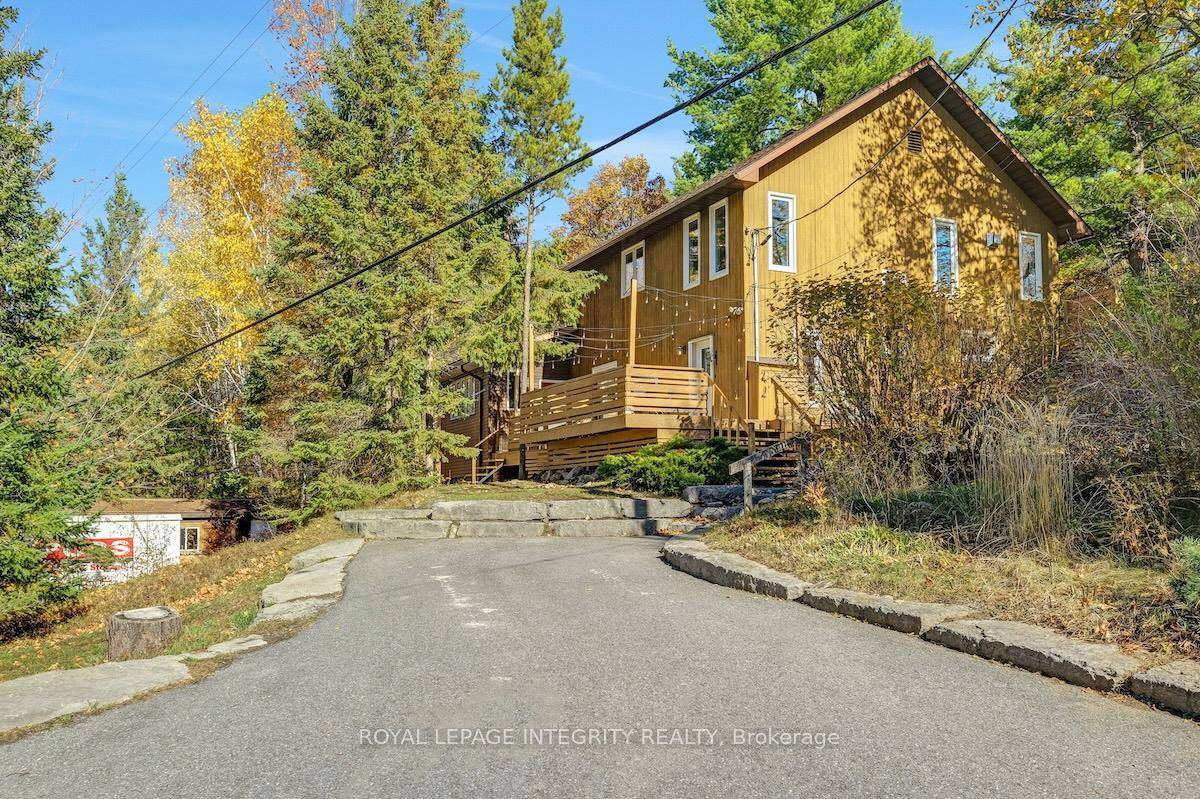 Tucked into the natural landscape of the Canadian Shield, this one of a kind home offers the perfect balance of peace, privacy, and proximity to recreation.