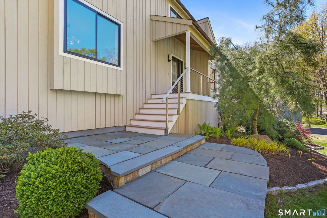 Welcome to this stylish contemporary home with deeded access to Pine Wood Lake, offering the perfect blend of modern open concept living and a vibrant beach and lake community all ...