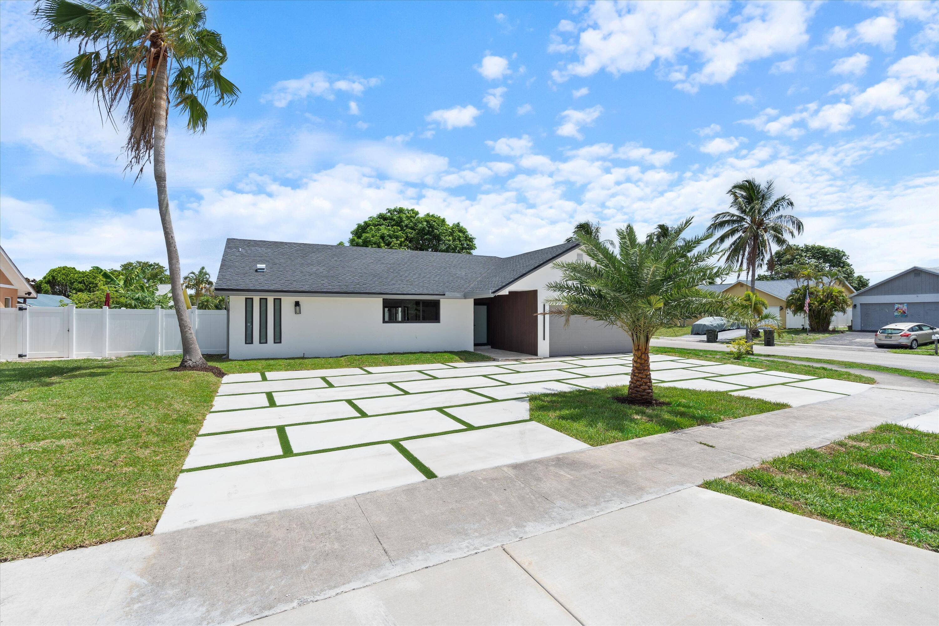 This stunning 4 bedroom, 3 bathroom home has been completely gutted to the studs and rebuilt with top tier finishes throughout.