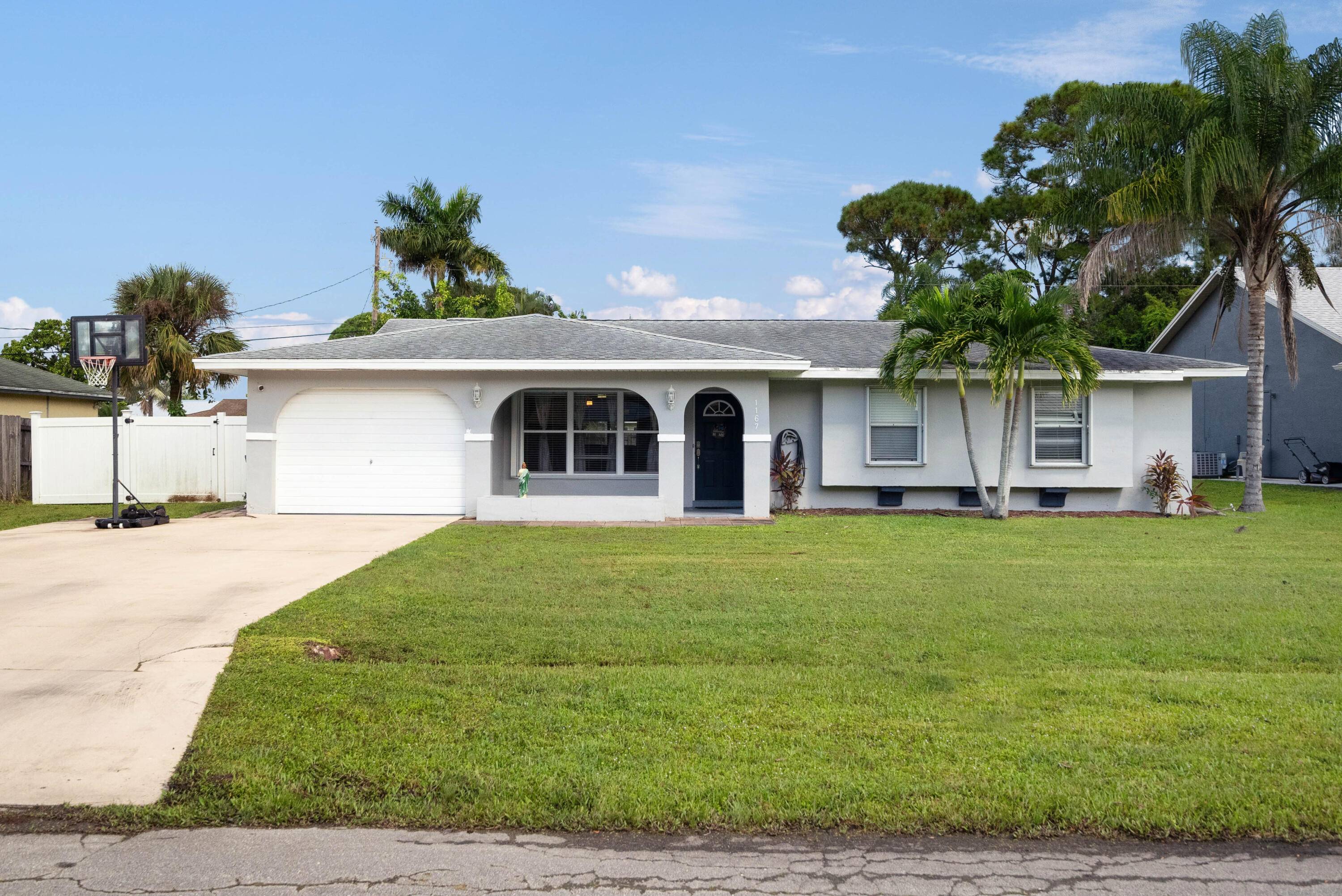 Charming CBS home with private fenced backyard, 3 Bedrooms, 2 Bathrooms home with one car garage.