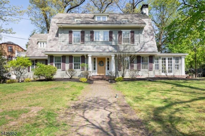 SITUATED IN THE HEART OF THE NETHERWOOD HEIGHTS HISTORIC DISTRICT, this timeless 1927 Center Hall Colonial offers classic charm with modern updates.