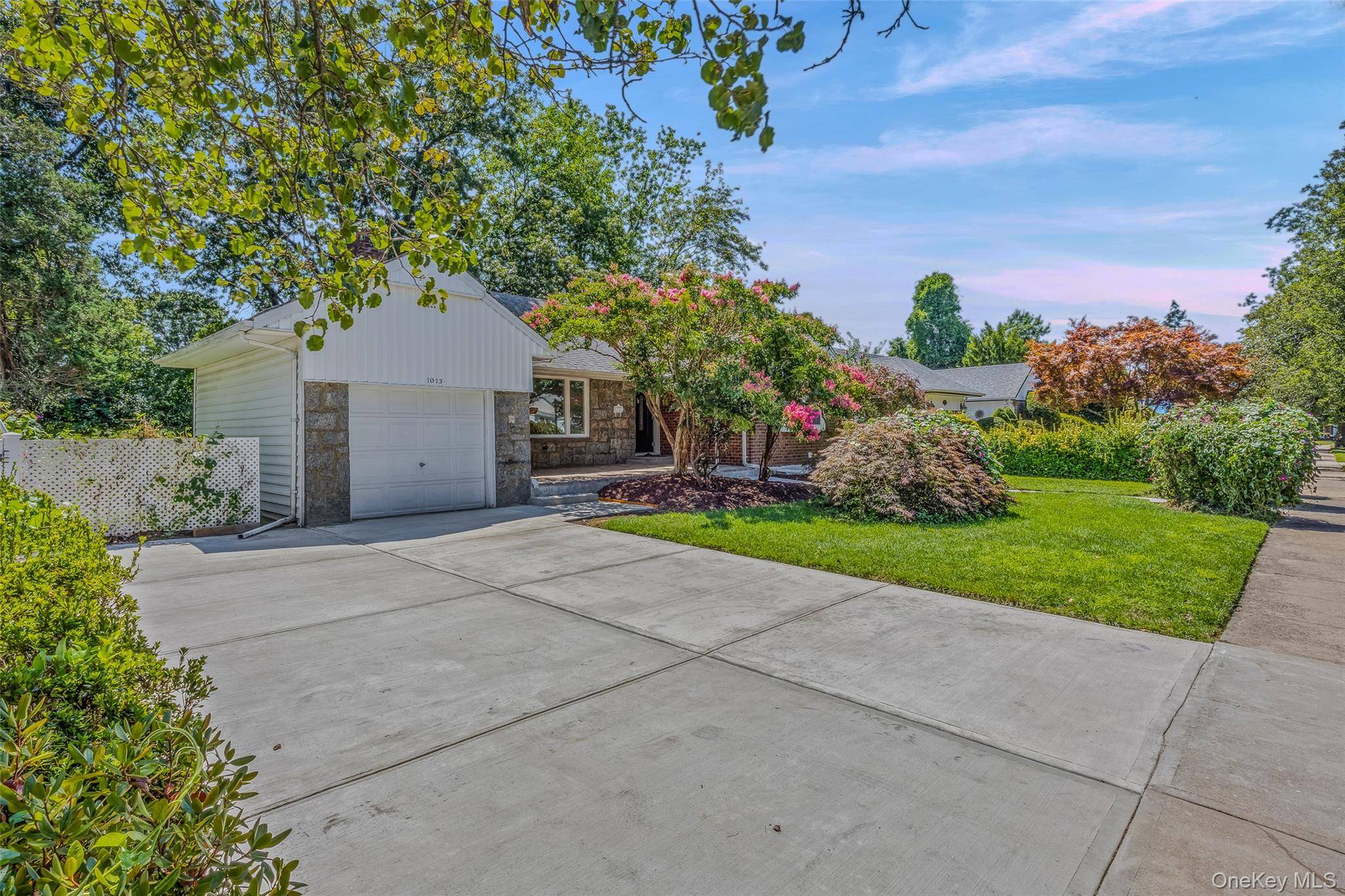 This contemporary Ranch home, situated in the heart of Valley Stream, boasts three spacious bedrooms and two bathrooms, blending modern updates with classic elegance.
