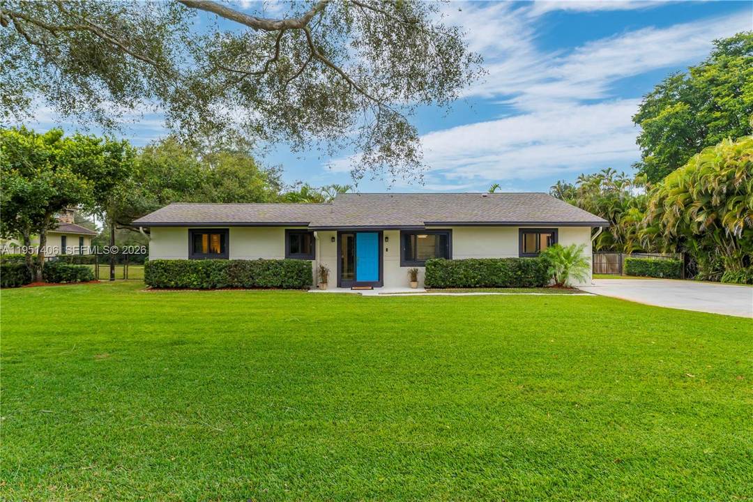 Spacious 2 bedroom, 2 bath ranch style home set on a sprawling full acre with no HOA, tucked away on a quiet road truly a rare Davie gem.
