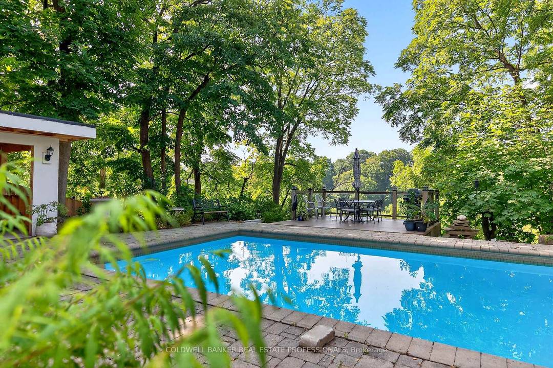 Resort Style Cottage Living in the Heart of Old Oakville now at a New Price !